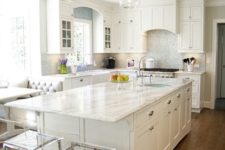 07 all-white kitchen decor with a silver backsplash and white quartz counters for a serene look