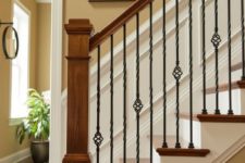 07 classic warm wood stairs with stylish iron railing can make a statement