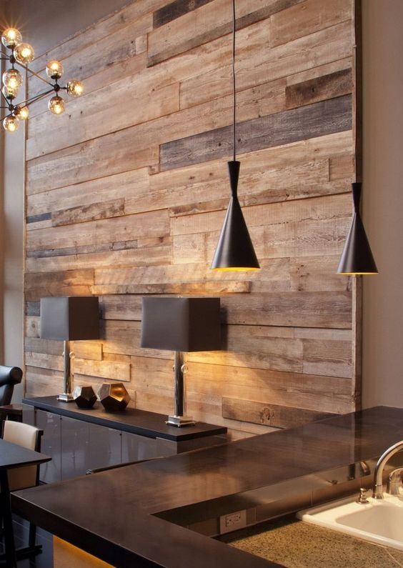 reclaimed wood wall gives this space comfiness, warmth and looks textural