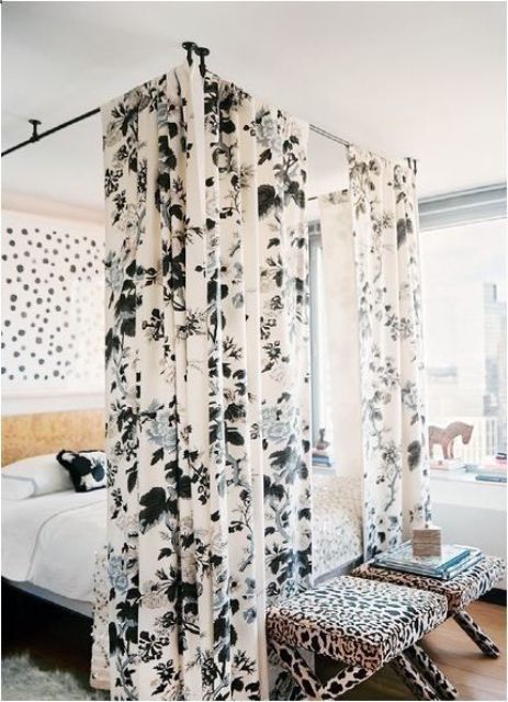 frame attached to the ceiling and bold printed curtains for a statement