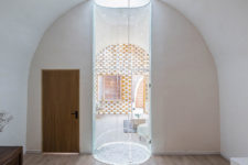 10 The central skylight creates a light tunnel separating the bedroom and living space