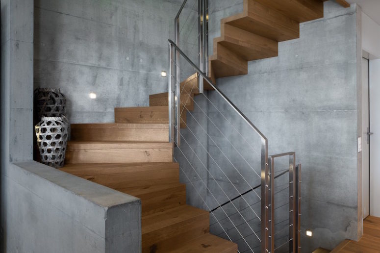 spiral staircase design The spiral staircase has a very graceful and elegant design, featuring a combination of wood and concrete