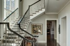 12 traditional stairs with a gorgeous wrought iron balustrade
