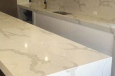 14 minimalist white kitchen with chic quartz counters looking like marble
