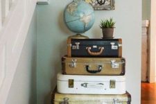15 vintage suitcases stacked in your entryway can be not only a source of inspiration but also creative storage