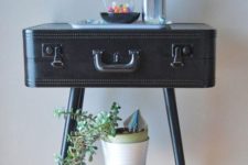 16 vintage suitcase turned into a console table for an entryway looks cool