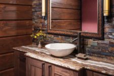 17 wooden vanity in warm hues with a stone countertop