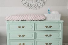 18 mint-colored dresser repurposed into a diaper changing table