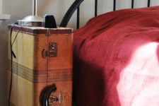 18 repurpose an old suitcase into your nightstand and rock it for storage