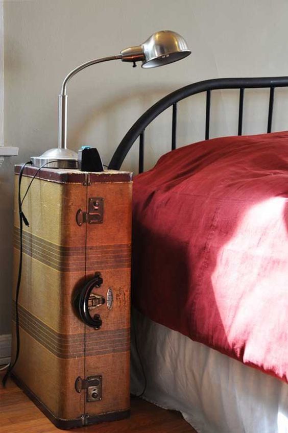 repurpose an old suitcase into your nightstand and rock it for storage