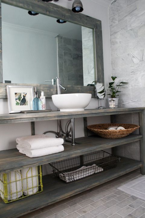 simple open vanity shelving system with a small vessel sink