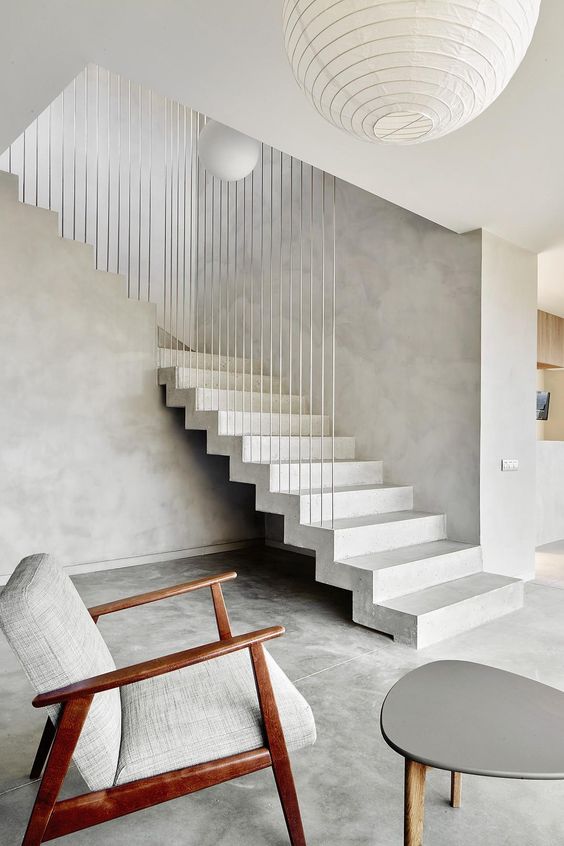vertical cable railing for a statement in this modern space