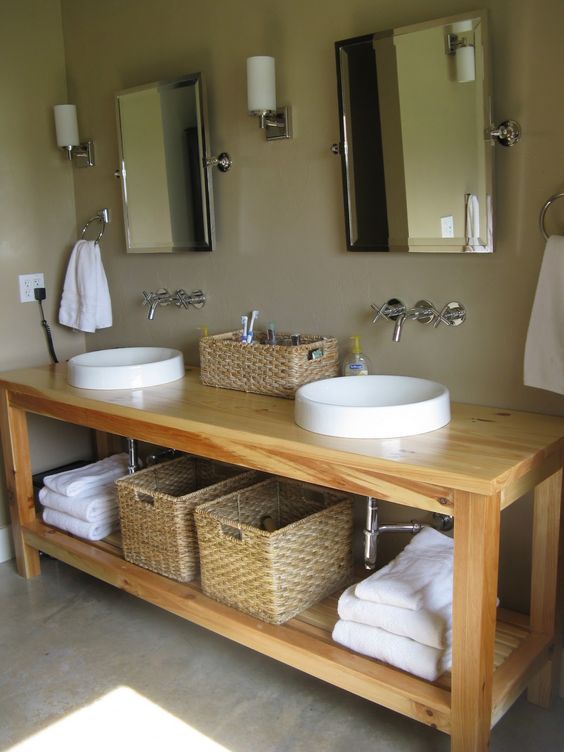 light-colored open double wooden vanity