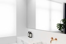 25 small white marble modern bathroom with a mirror and counter in a niche