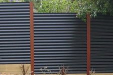 26 corrugated metal privacy fence is a very durable and modern option
