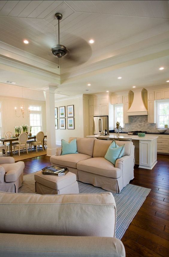 neutral kitchen in ivory and a tan living room to separate the zones