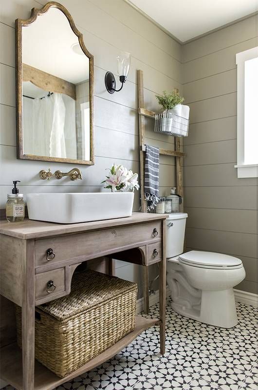 reclaimed wood vanity with drawers and a shelf done in vintage style