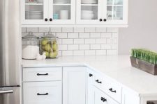 27 farmhouse white kitchen with white subway tiles and counters