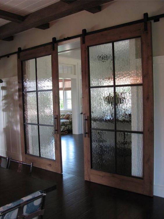 rustic sliding doors with wood and rain glass