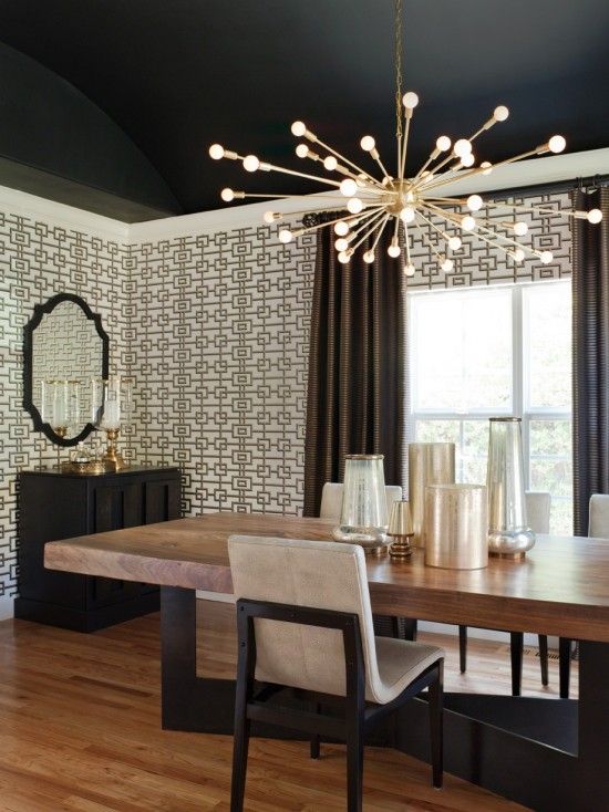 refined geometric wallpaper creates an ambience in this room