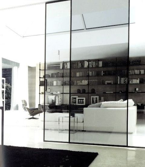 sliding glass doors floor to ceiling, almost no framing