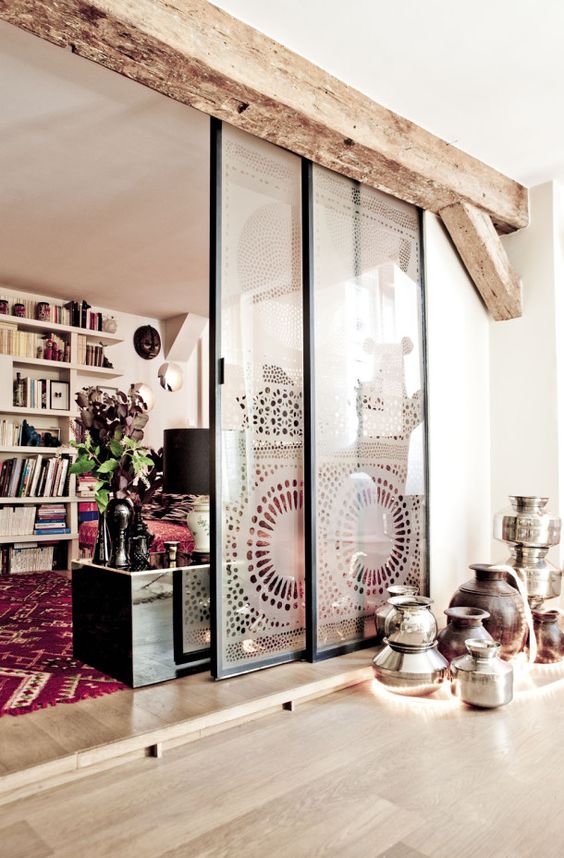 sliding glass doors covered with lace screens for a relaxed boho feel