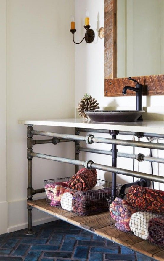 reclaimed wood, pipes and a stone countertop vanity for a bathroom