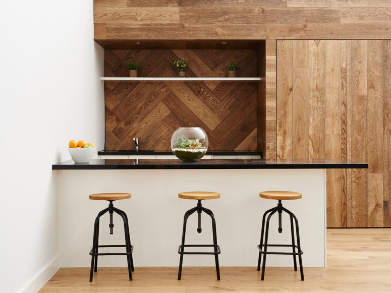 wood planks clad in a chevron pattern makes a great accent wall (Kustom Timber)