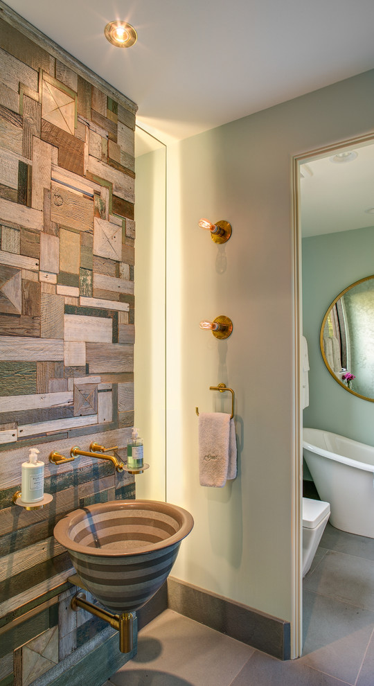 patchwork woo wall looks great in a powder room (Selle Valley Construction, Inc.)