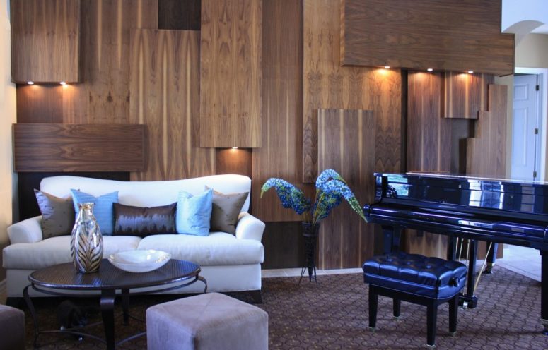 architectural wood wall panels definitely make a statement if they made of walnut wood (IN Studio &amp; Co. Interiors)