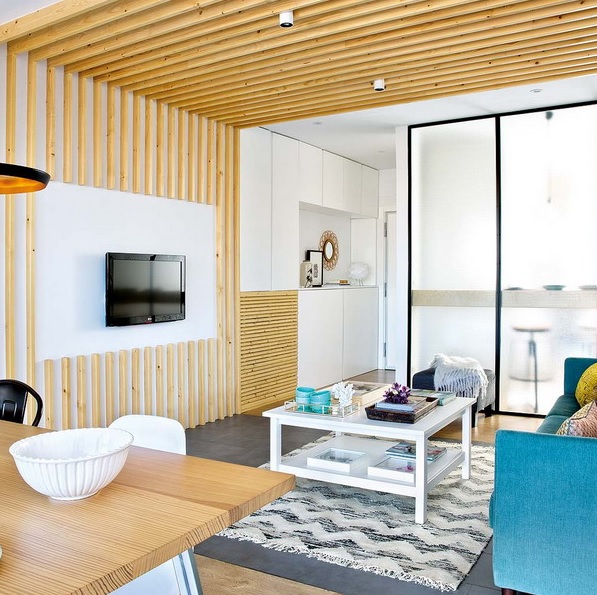 This modern apartment is flooded with light, it's full of fresh touches and cool decor ideas