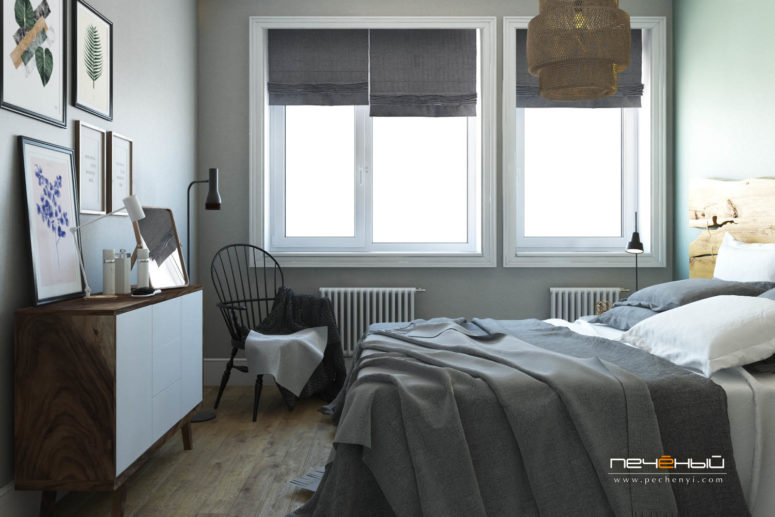 bedroom with raw wood The bedroom is done in light grey and with warm woods, botanical artworks enliven it and raw wood makes the space cozier