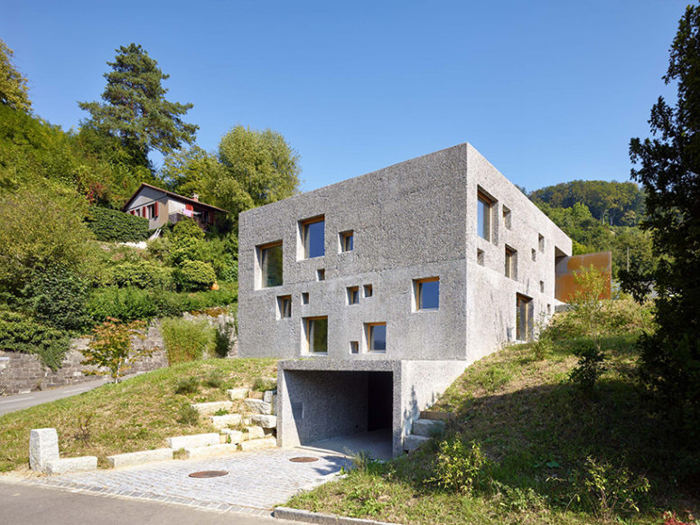 Modern Concrete House Puntured With Square Windows DigsDigs