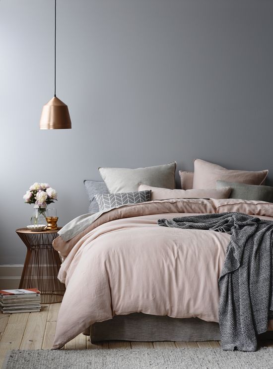 a girlish bedroom with a copper pendant lamp that completes the color scheme in a perfect way