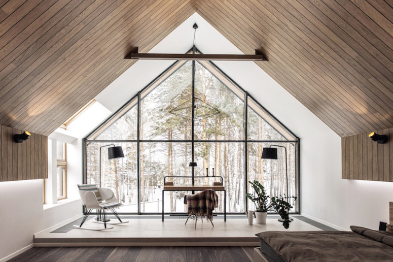 super large windows The windows are large and offer complex views of the surroundings, welcoming the outdoors in