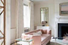 04 a modern living room features a sculptural pink sofa on wooden legs