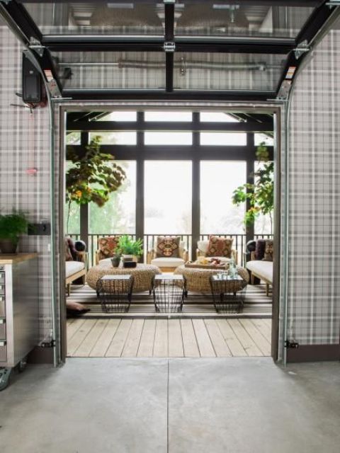 a garage door leading from the kitchen to the screened porch