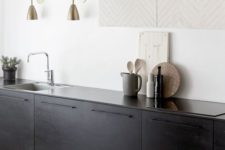 05 black kitchen cabinets contrast with white walls