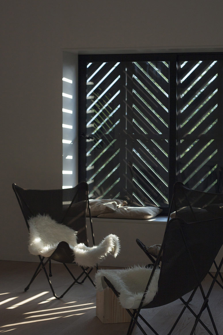 Window shutters closed creates lighting and shadow plays