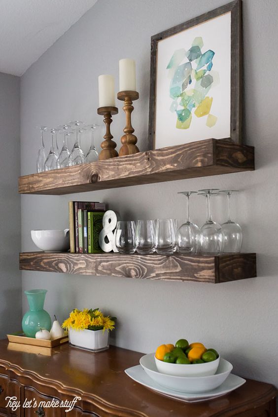thick wooden shelves for displaying glasses and candle sticks