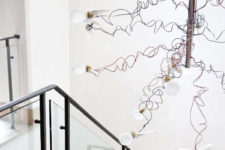 09 The stairs are marked with a snitch-inspired chandelier, which looks crazy and cute