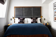 09 large upholstered headboard in a wooden frame is great to make a statement