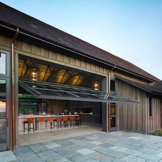 a large dining space on the kitchen island opened to the outside