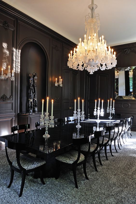 a vintage dining space with a gorgeous large crystal chandlier in white