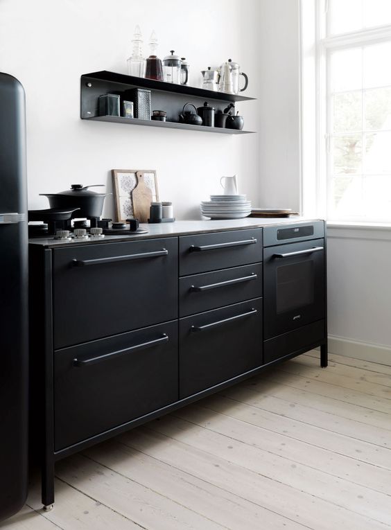 stylish black metal furniture is ideal for a modern manly kitchen