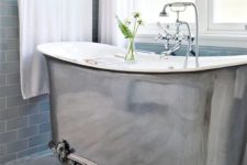 16 a stunning metallic claw-foot tub with a vintage feel
