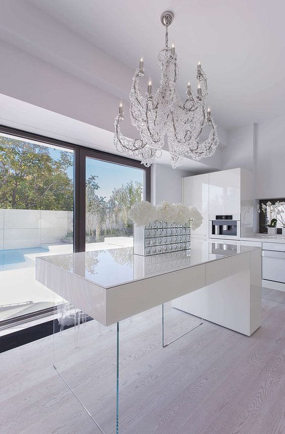 30 Refined Glam Chandeliers To Make Any E Chic Digsdigs A Minimalist White Kitchen Is Spruced Up With Modern Crystal Covered Chandelier
