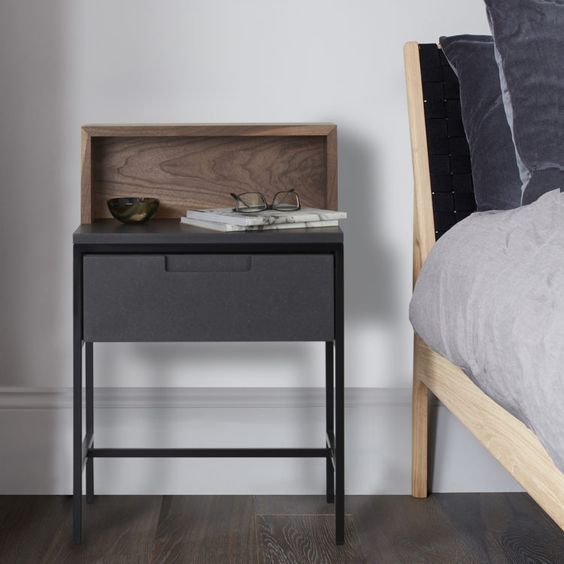 elegant bedside table with a wooden lid and a drawer on a metal frame
