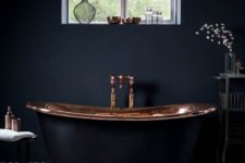 19 charcoal bathtub with a copper finish inside for an art deco space