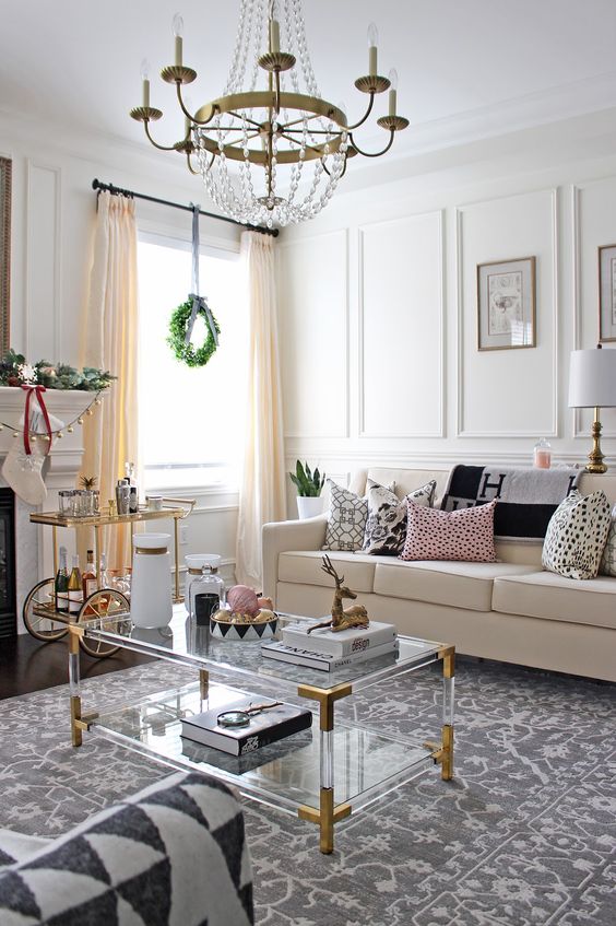 acrylic table with brass corners is a very edgy idea